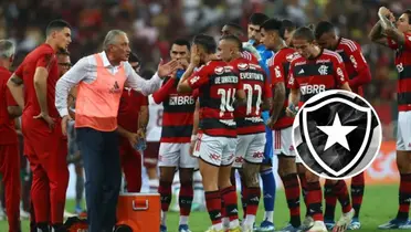 Tite com o elenco do Flamengo e o escudo do Botafogo ao lado